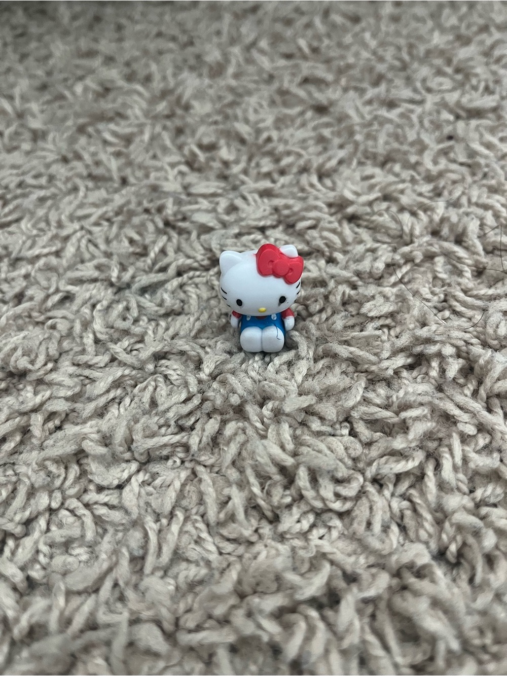 Hello Kitty White Figure with Red Bow and Blue Outfit
